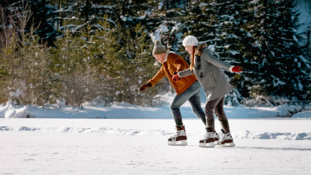 istock Couple enjoying ice skating 1631511985