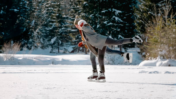 istock Couple enjoying ice skating 1631511987