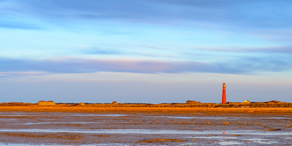 Colorful sunset at the beach of Schiermonnikoog island in the Dutch Waddensea region in the North of The Netherlands.