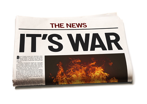 IT'S WAR, says bold headline in a simulated newspaper.