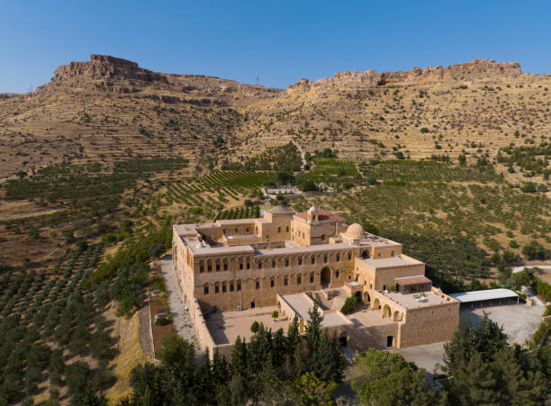 Mor Gabriel Monastery and Midyat City Drone Photo, Midyat Mardin, Turkey (Turkiye) Mor Gabriel Monastery and Midyat City Drone Photo, Midyat Mardin, Turkey (Turkiye) escort bayan diyarbakır stock pictures, royalty-free photos & images