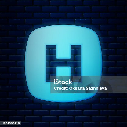 istock Glowing neon Hospital signboard icon isolated on brick wall background. Vector 1631553146