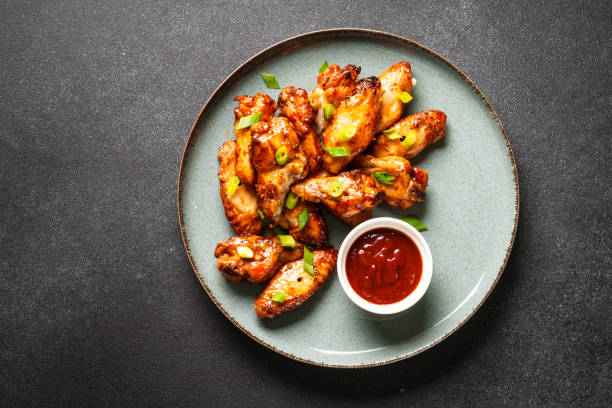 istock Chicken wings in bbq sauce grilled . 1631554234