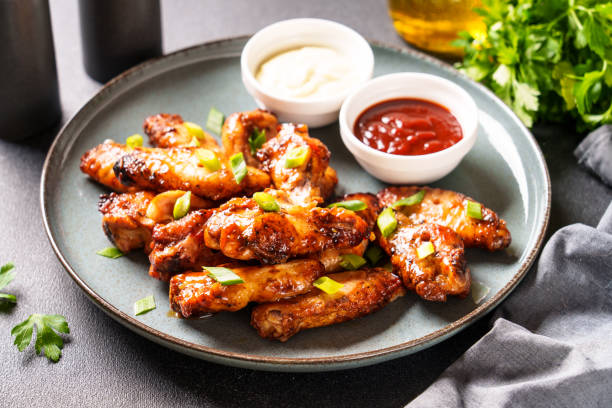 istock Chicken wings in bbq sauce grilled . 1631554253