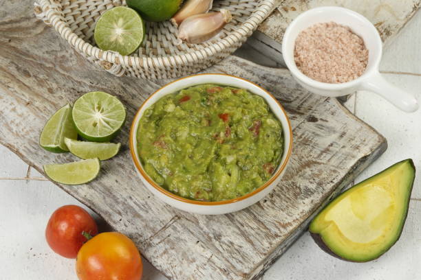 istock homemade guacamole dip in a bowl with ingredient 1631562293