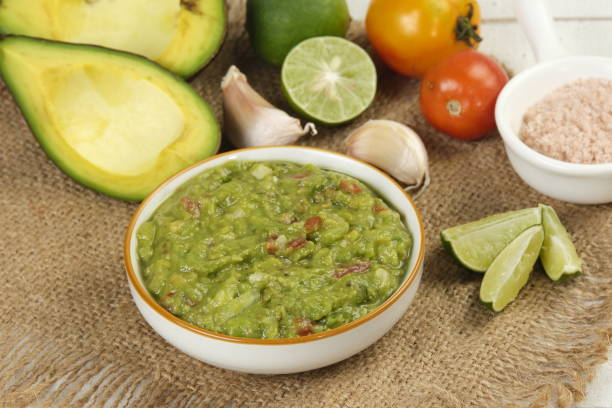 istock homemade guacamole dip in a bowl with ingredient 1631565156