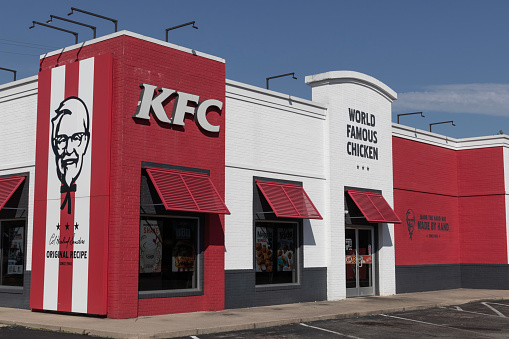 Harrison - August 20, 2023: KFC Fried Chicken restaurant. Kentucky Fried Chicken is offering Uber and Door Dash delivery and drive thru service.