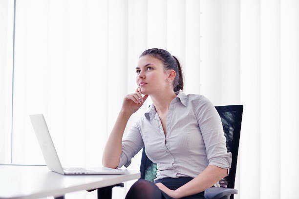 istock business woman at  office 163159951