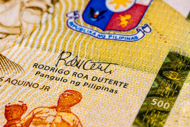 Extreme macro photography of a 100 Peso banknote. Ultra close up of a one hundred filipino peso note. Legal Tender for private and public of the island state of the Philippines. Microscopic capture Extreme macro photography of a 100 Peso banknote. Ultra close up of a one hundred filipino peso note. Legal Tender for private and public of the island state of the Philippines. Microscopic capture philippines currency stock pictures, royalty-free photos & images