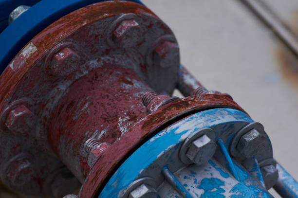 istock Nuts for steel pipe joints in industrial systems 1631620600