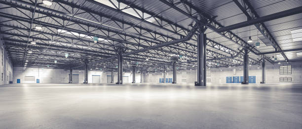 istock horizontal image of an empty warehouse with a metal structure. 1631630763