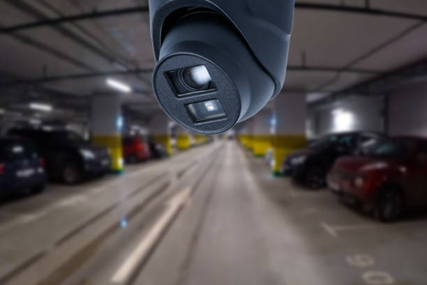 istock CCTV camera or surveillance system on indoor car parking. 1631636808