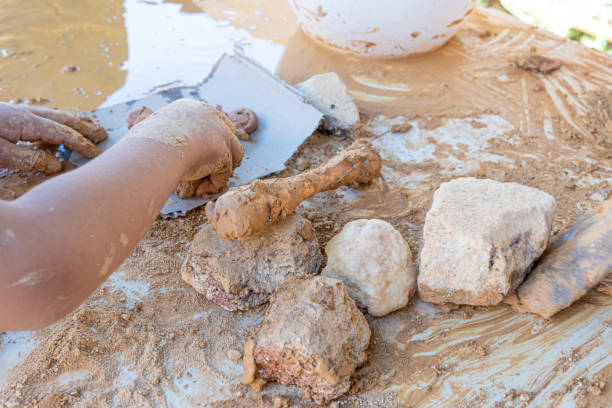 istock child modeling natural clay from crushed clay rocks with sculpting tools 1631641307