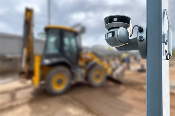 istock CCTV camera watching an excavator and workers working on a construction site. 1631648058