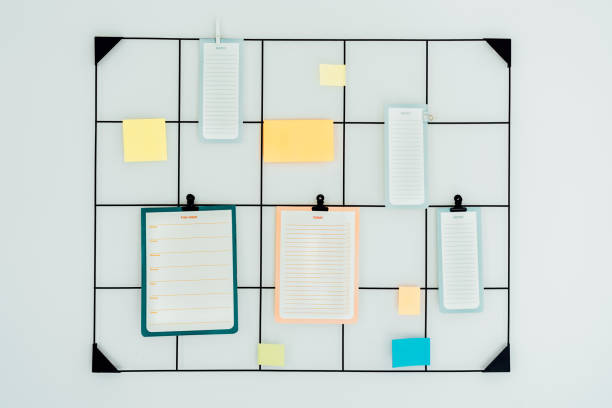 istock Black grid mood inspiration board with mockup empty notes, Check lists and stickers on clamps for ideas, organizations, memories, wish lists with copy space. Plans for day and week. Selective focus 1631651454