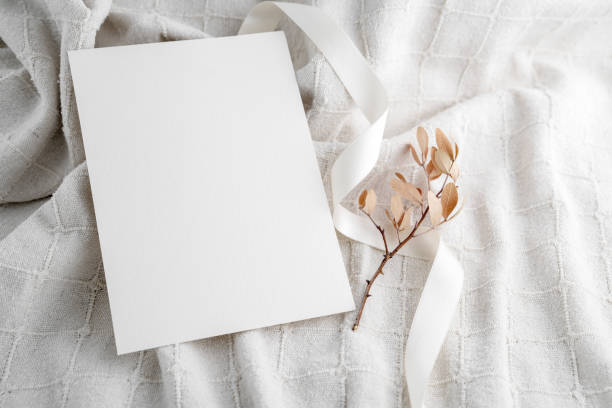 istock Empty Wedding invitation mockup on linen fabric background 1631673088
