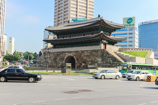 Seoul, South Korea - July 26, 2020 - Paldalmun Gate is the southern gate of Hwaseong Fortress. The gate has an entrance wide enough to let the king's palanquin pass through. Roundabout runs around