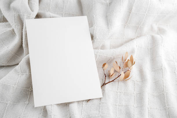 istock Empty Wedding invitation mockup on linen fabric background 1631675404