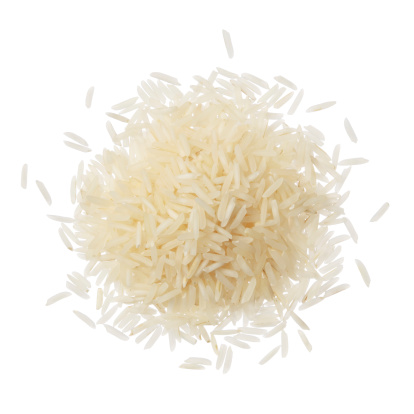 Basmati rice pile isolated on white background
