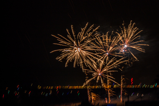 image of fireworks lighting up the sky with Barcelona in the background