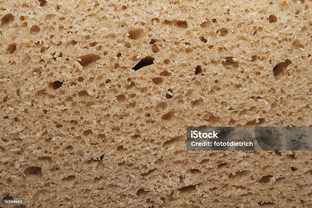 Тёмный хлеб slice - Стоковые фото Батон роялти-фри