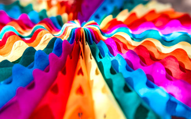 istock Rainbow colored paper decorations close-up abstract background 1631718860