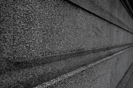 Side close-up of retro concrete background wall
