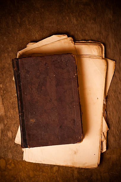 istock Vintage book and old torn yellow pages 163174841
