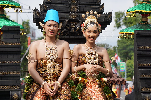 Blitar, East Java, Indonesia - July 15th, 2023 : A couple with a traditional wedding dress