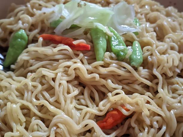 istock fried noodles with chilies and vegetables 1631792634