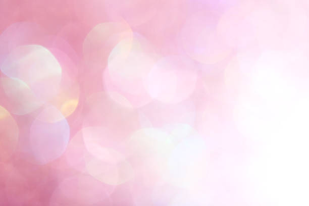 istock Pink, white, yellow and turquoise soft lights abstract background 1631798674