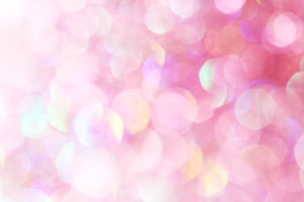 istock Pink, white, yellow and turquoise soft lights abstract background 1631804567