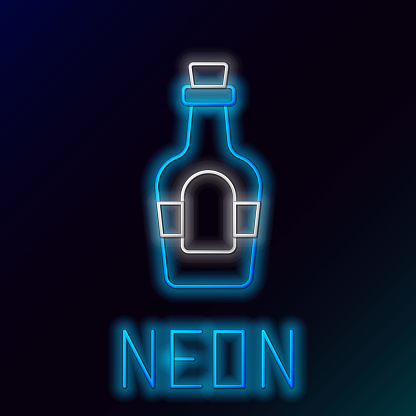 Glowing neon line Alcohol drink Rum bottle icon isolated on black background. Colorful outline concept. Vector.