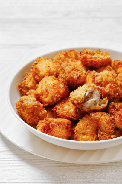 istock crispy fried panko breaded chicken bites in bowl 1631815299