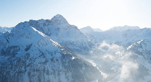 Mountain Panorama Bird's eye view on a sunny winter day - Mittelberg in Austia - Kleinwalsertal - Adobe RGB kleinwalsertal stock pictures, royalty-free photos & images