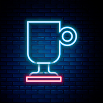 Glowing neon line Irish coffee icon isolated on brick wall background. Colorful outline concept. Vector.
