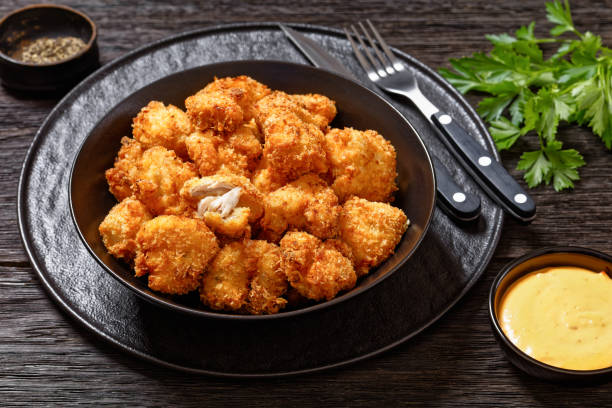 istock crispy fried panko breaded chicken bites in bowl 1631818610