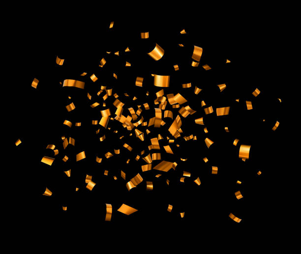 istock Golden cut out foil ribbon confetti on black background. 1631827116