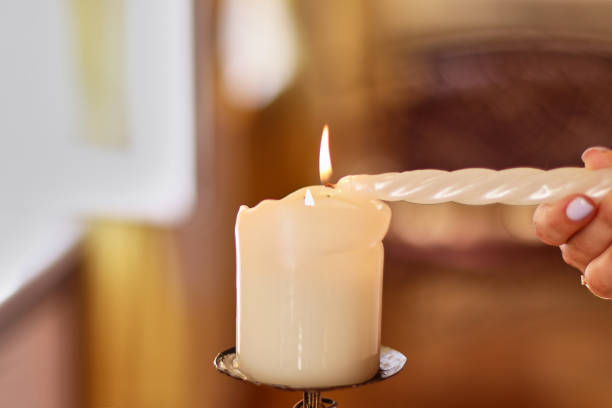 istock Burning decorative candle. Attributes of a religious holiday. 1631827130