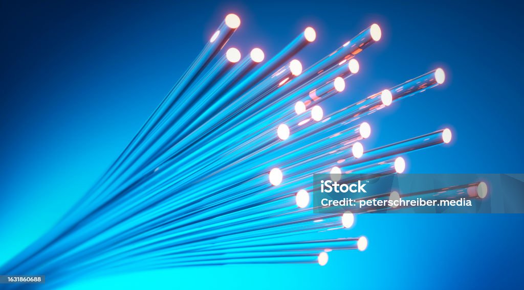 Illuminated Fiber optics cable Close up of fiber optics cable with light effects and blue background - 3D illustration Fiber Optic Stock Photo