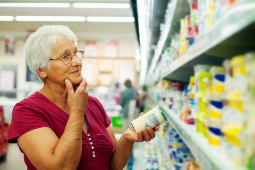 Senior woman at groceries store