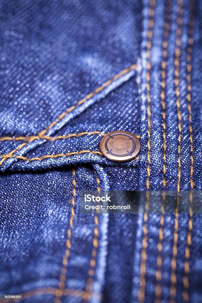 Macro Detail of blue jeans fabric Macro Detail of blue jeans fabric with a shallow DOF Jeans Stock Photo