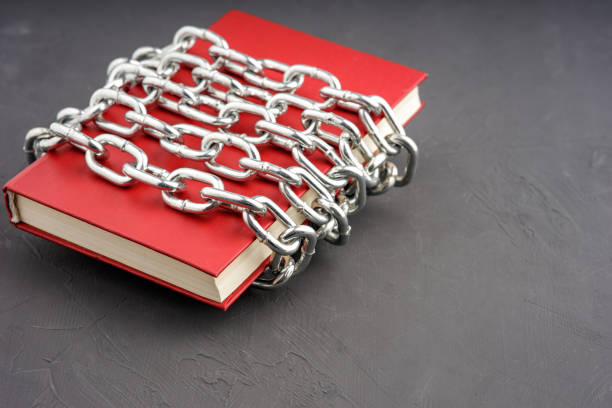 istock the book is closed and wrapped with a steel chain 1631887475