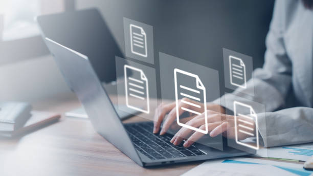 istock Business document icon. Business people using laptop to store documents and search for information. Document management with icons on virtual screen ERP. 1631896247
