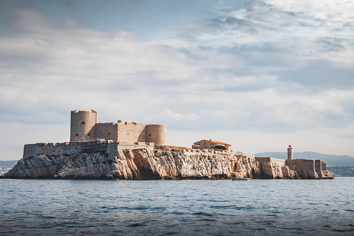 If Castle and lighthouse on If island. Taken in Marseille city, on the Mediterranean coast of Provence, in the department of Bouches-du-Rhone, in Provence-Alpes-Cote d'Azur region in France, Europe in a summer sunny day.