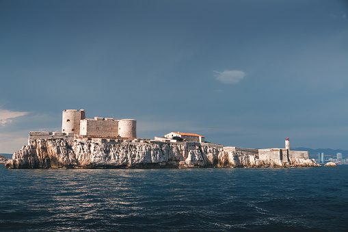 If Castle and lighthouse on If island. Taken in Marseille city, on the Mediterranean coast of Provence, in the department of Bouches-du-Rhone, in Provence-Alpes-Cote d'Azur region in France, Europe in a summer sunny day.
