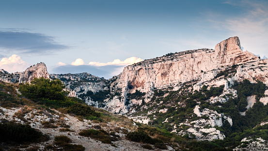 Panoramic mountain hill with green grass and snow isolated