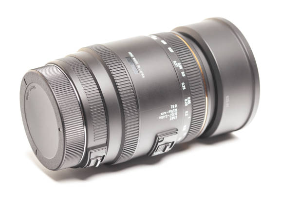 istock Camera photo lens macro isolated on white background 1631915405
