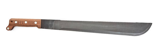 Double edge machete with wooden handle A machete with wooden handle isolated on a white background Machete stock pictures, royalty-free photos & images