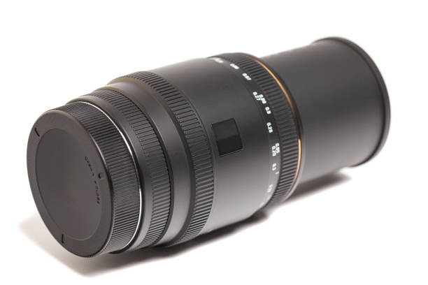 istock Camera photo lens macro isolated on white background 1631927541